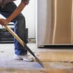 Asbestos Resilient Floor Covering Removal - Worker